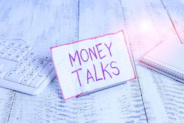 Conceptual hand writing showing Money Talks. Business photo showcasing the wealth gives power and influence to those who possess it Notepaper on wire in between computer keyboard and sheets. — 스톡 사진