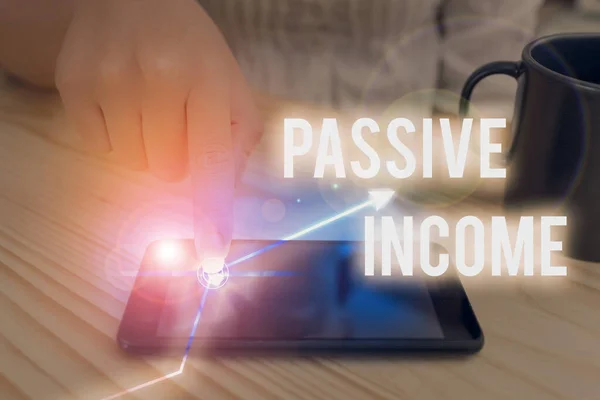 Text sign showing Passive Income. Conceptual photo the earnings derived from a rental property and others. — Stock Photo, Image