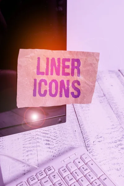 Writing note showing Liner Icons. Business photo showcasing use to improve visual interest and grab the user s is attention Notation paper computer monitor screen near white keyboard. — Stock Photo, Image