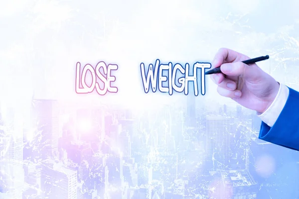 Conceptual hand writing showing Lose Weight. Business photo text the fact of a demonstrating s is or an animal s is body weight becoming less. — Stok fotoğraf