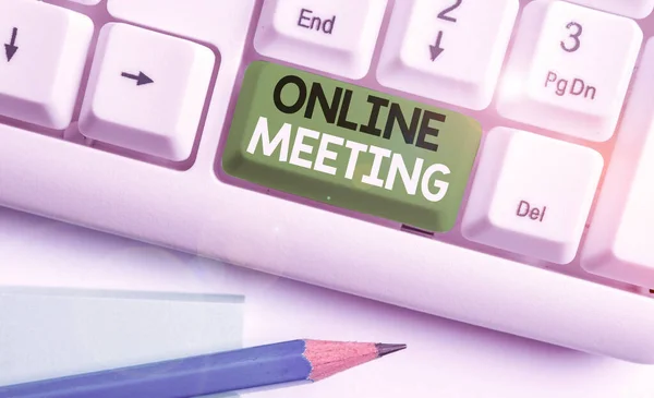 Conceptual hand writing showing Online Meeting. Business photo showcasing a meeting that takes place over an electronic medium.