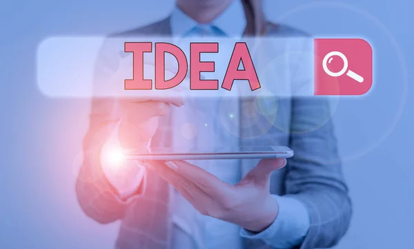 Escribiendo nota mostrando Idea. Foto de negocios mostrando un pensamiento o sugerencia en cuanto a un posible curso de acción Sugerencia . —  Fotos de Stock