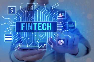 Handwriting text writing Fintech. Concept meaning Financial technology concept. Enabling through Tech and Fin FinTech to build system and concepts without banks..