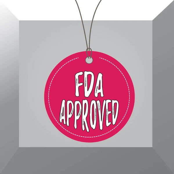 Conceptual hand writing showing Fda Approved. Business photo showcasing FDA agreed the product or formula is safe and or effective Label string round empty tag colorful background small shape. — Stock Fotó