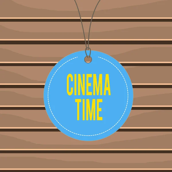 Conceptual hand writing showing Cinema Time. Business photo text which entertainment such showing movie scheduled to start Label string round empty tag colorful background small shape. — Stockfoto