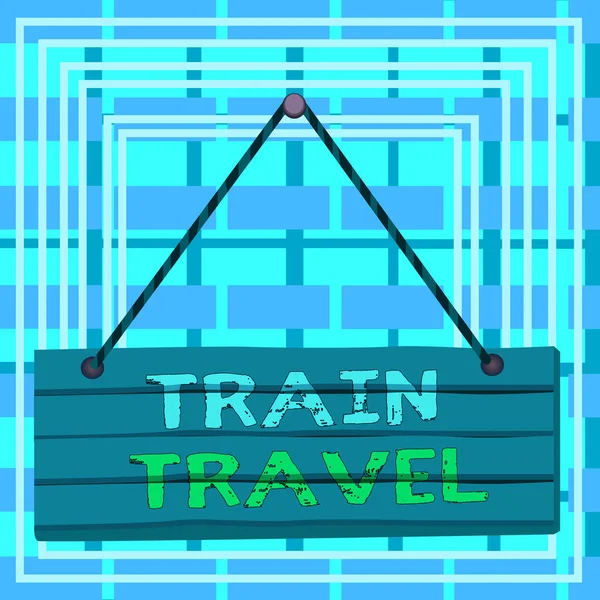 Text sign showing Train Travel. Conceptual photo to make a journey a long distance by using rail transit Wood plank nail pin string board colorful background wooden panel fixed. — Stock Photo, Image