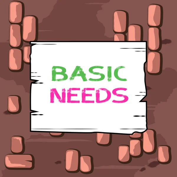単語の書き込みテキスト基本的なニーズ。あなたが持続または生活を維持するために持っている必要があります何かのためのビジネスコンセプト木製の正方形の板空のフレームスロット溝木パネル色板木材. — ストック写真