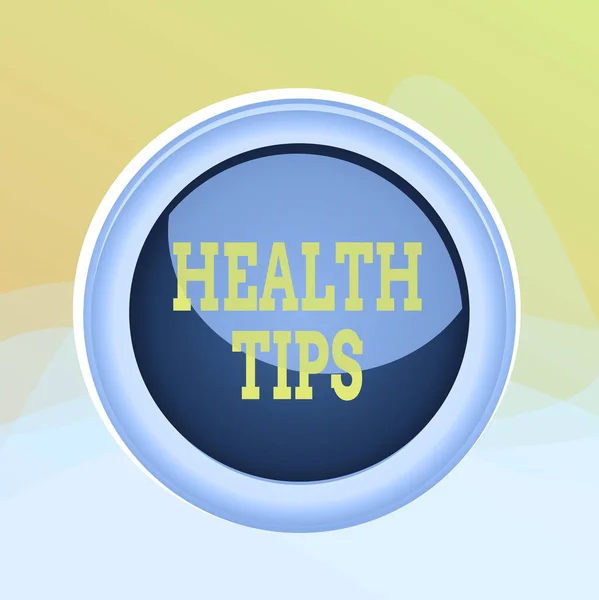 Writing note showing Health Tips. Business photo showcasing beneficial to one s is physical mental or emotional state Colored sphere switch center background middle round shaped.