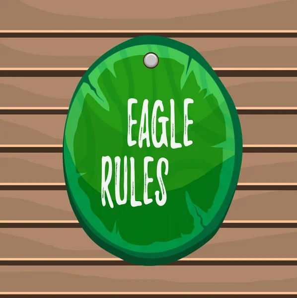 Ecriture conceptuelle montrant Eagle Rules. Texte de la photo d'affaires un énorme ensemble de règles de conception que votre mise en page doit passer planche ovale ronde en bois panneau rond en forme de cercle fond en bois . — Photo