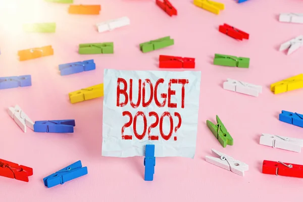 Writing note showing Budget 2020 Question. Business photo showcasing estimate of income and expenditure for next year Colored clothespin papers empty reminder pink floor office pin. — Stockfoto