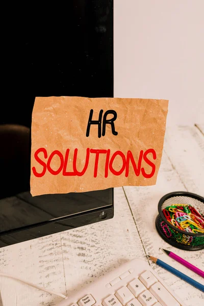 Text sign showing Hr Solutions. Conceptual photo all the technology businesses use to manage demonstratingnel Note paper taped to black computer screen near keyboard and stationary. — Stok fotoğraf