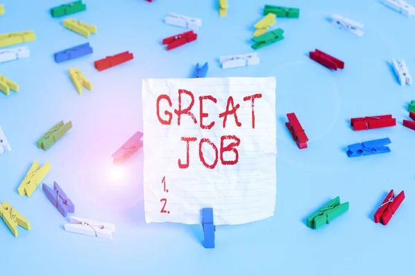 Writing note showing Great Job. Business photo showcasing used praising someone for something they have done very well Colored clothespin papers empty reminder blue floor officepin.