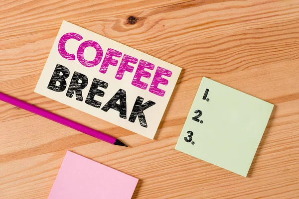 Text sign showing Coffee Break. Conceptual photo short time when you stop working to have a cup of coffee Colored clothespin papers empty reminder wooden floor background office. — Φωτογραφία Αρχείου