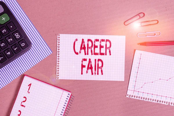 Word writing text Career Fair. Business concept for an event at which job seekers can meet possible employers Striped paperboard notebook cardboard office study supplies chart paper.