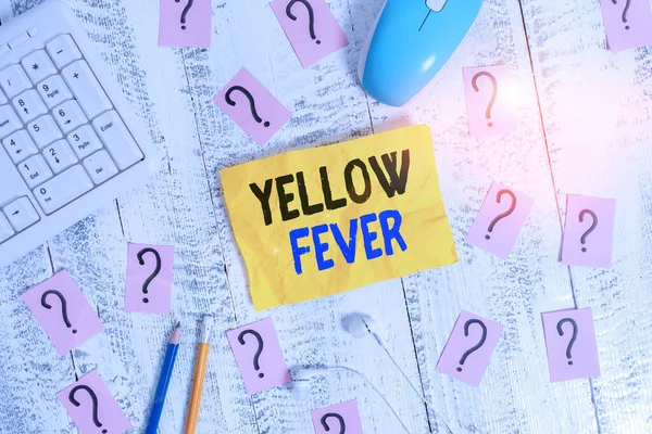 Εννοιολογικά χειρόγραφα που δείχνουν κίτρινο πυρετό. Επιχειρηματική φωτογραφία που δείχνει τροπική ασθένεια του ιού που επηρεάζει το ήπαρ και τα νεφρά Εργαλεία γραφής και μουτζουρωμένο χαρτί στην κορυφή του ξύλινου τραπεζιού. — Φωτογραφία Αρχείου