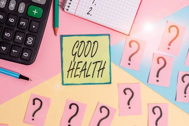 Handwriting text writing Good Health. Concept meaning state of being vigorous and free from bodily or mental disease Mathematics stuff and writing equipment above pastel colours background.