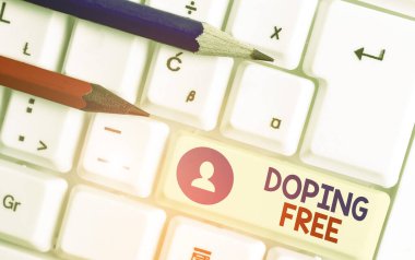 El yazısı metni Doping Free. Atletizmi yasal olmayan yollarla geliştirmek için herhangi bir madde kullanmadığı kanıtlandı..