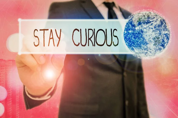Word writing text Stay Curious. Business concept for attention through being inexplicable or highly unusual Elements of this image furnished by NASA. — Stockfoto