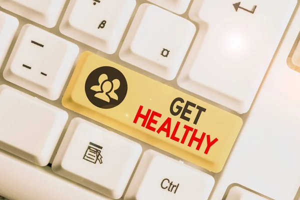 Escribiendo una nota mostrando Get Healthy. Foto de negocios mostrando poseer o disfrutar de una buena salud o una mentalidad sana . — Foto de Stock