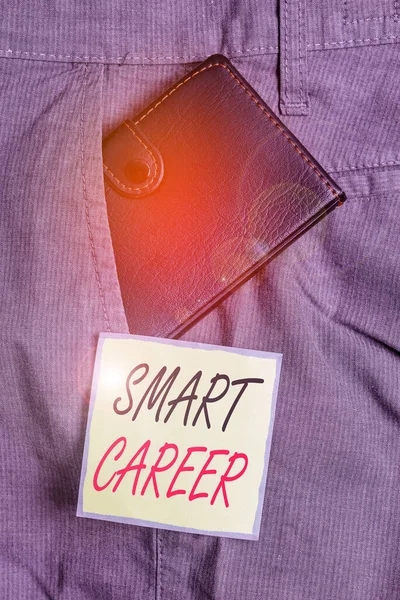 Text sign showing Smart Career. Conceptual photo job or profession that you have been trained for Expert on it Small little wallet inside man trousers front pocket near notation paper. — Stockfoto