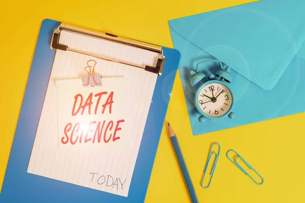 Writing note showing Data Science. Business photo showcasing multidisciplinary field that uses scientific methods Clipboard sheet note pencil clips clock envelop colored background. — Φωτογραφία Αρχείου