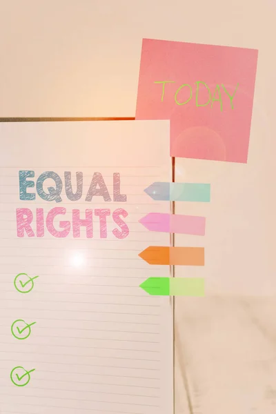 Writing note showing Equal Rights. Business photo showcasing Equality before the law when all showing have the same rights Hard cover note book sticky note arrow banner inserted clear background.