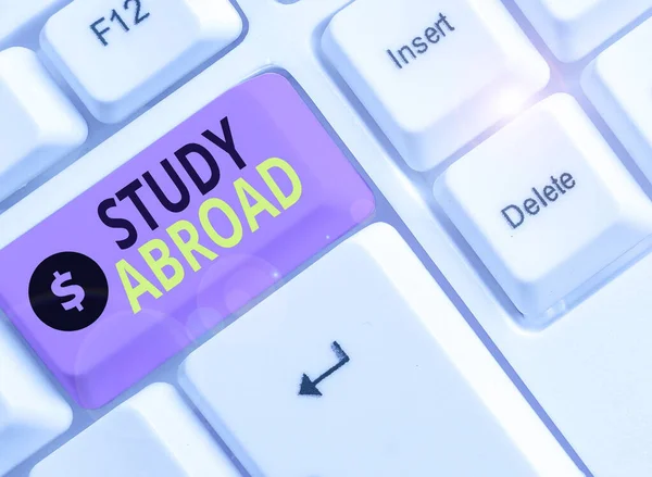 Word writing text Study Abroad. Business concept for live in a foreign country and attend a foreign university.