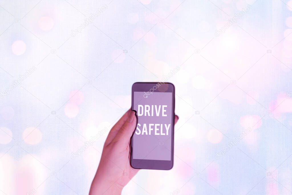Text sign showing Drive Safely. Conceptual photo you should follow the rules of the road and abide laws.