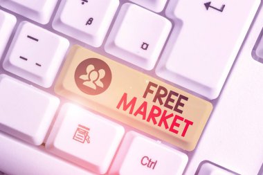 Writing note showing Free Market. Business photo showcasing an unregulated system of economic exchange or free competition.