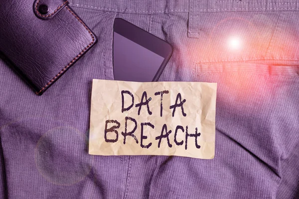 Writing note showing Data Breach. Business photo showcasing incident in which sensitive or confidential data is copied Smartphone device inside trousers front pocket with wallet.