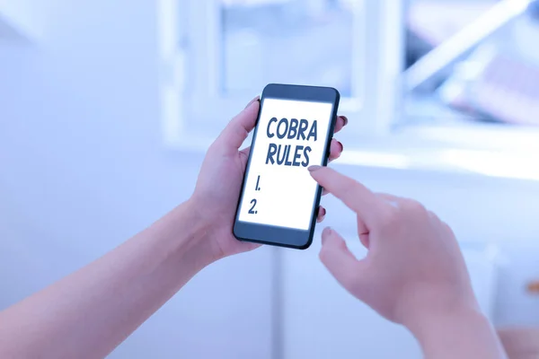 Text sign showing Cobra Rules. Conceptual photo continuing group health insurance coverage after a job loss. — Stock Photo, Image