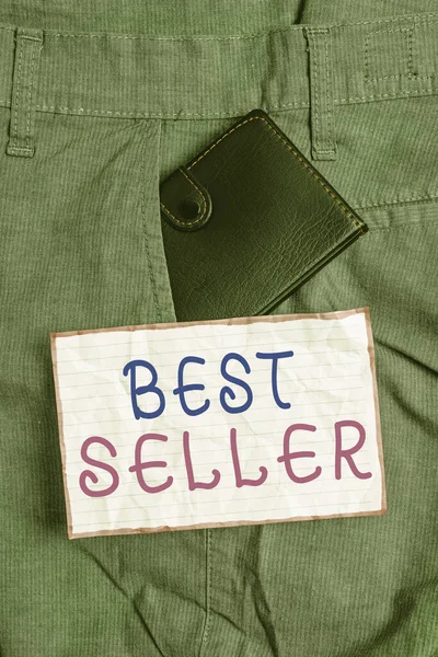 Signo de texto que muestra Best Seller. Nuevo libro de fotos conceptuales u otro producto que ha vendido un gran número de copias Pequeña billetera dentro del bolsillo delantero de los pantalones del hombre cerca del papel de la notación . — Foto de Stock