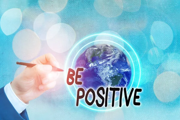 Conceptual hand writing showing Be Positive. Business photo text giving cause for hope and confidence Without any doubt Elements of this image furnished by NASA. — Stock Photo, Image