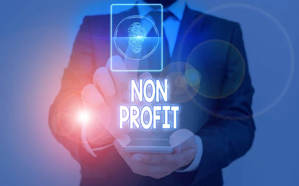 Writing note showing Non Profit. Business photo showcasing not making or conducted primarily to make profit organization.