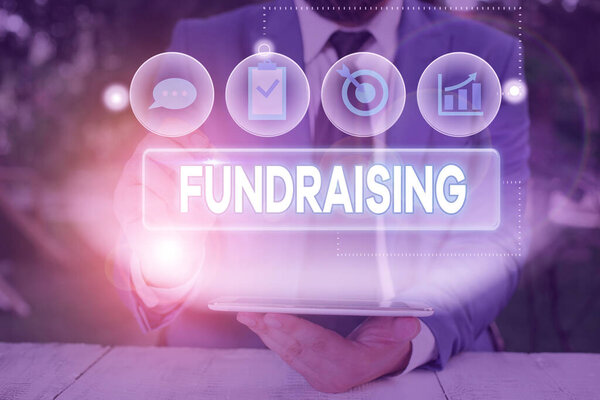 Word writing text Fundraising. Business concept for seeking to generate financial support for charity or cause.
