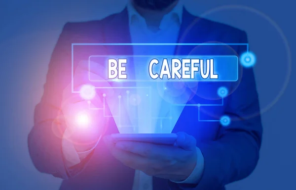 Texto escrito Seja cuidadoso. Conceito de negócio para se certificar de evitar o perigo potencial acidente ou dano . — Fotografia de Stock