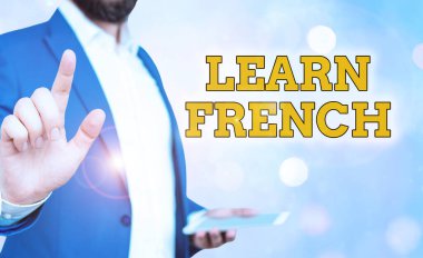 Word writing text Learn French. Business concept for get knowledge or skill in speaking and writing French language. clipart