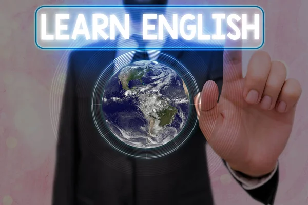 Writing note showing Learn English. Business photo showcasing gain acquire knowledge in new language by study Elements of this image furnished by NASA. — Stock Photo, Image