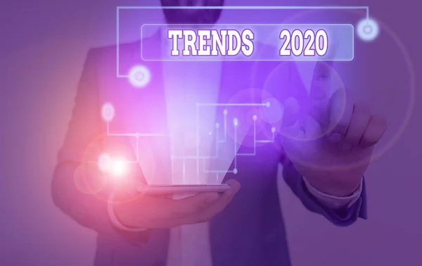 Schrijf notitie met de Trends 2020. Zakelijke foto waarin de algemene richting wordt belicht waarin iets zich ontwikkelt of verandert. — Stockfoto