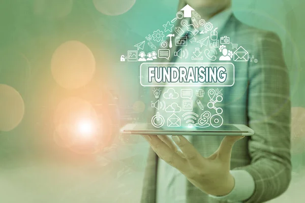 Conceptual hand writing showing Fundraising. Business photo text seeking to generate financial support for charity or cause. — Stock Photo, Image