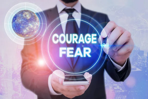 Handschrift tekst Courage Fear. Concept betekent kwaliteit van de geest die het mogelijk maakt een demonstrerende moeilijkheidsgraad tegemoet te treden Elementen van dit beeld geleverd door NASA. — Stockfoto