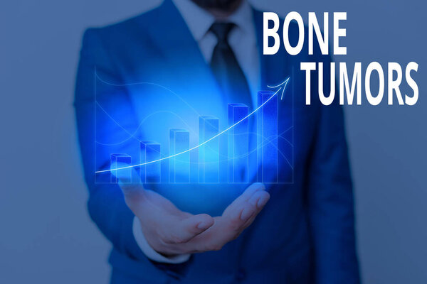 Conceptual hand writing showing Bone Tumors. Business photo showcasing can be either benign or malignant growths found in the bone.