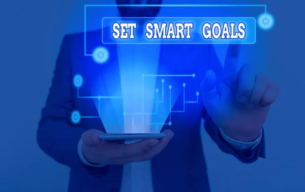 Pisząc notatkę pokazującą Set Smart Goals. Lista pokazów zdjęć biznesowych, aby wyjaśnić swoje pomysły skupić wysiłki mądrze wykorzystać czas. — Zdjęcie stockowe