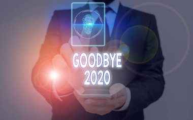 Elveda 2020 'yi gösteren bir not yazıyorum. İş fotoğrafı gösterimi ayrılırken veya geçen yılın sonunda iyi dileklerini iletiyor..