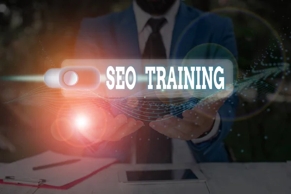 Handwriting text Seo Training. Concept meaning learn specific knowledge improve performance in current roles.