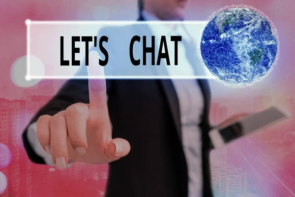 Writing note showing Lets Is Chat. Business photo showcasing inviting the demonstrating to have informal conversation with you Elements of this image furnished by NASA.