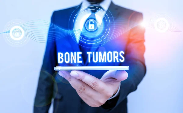 Escritura manual conceptual que muestra tumores óseos. Texto de la foto de negocios puede ser crecimiento benigno o maligno que se encuentra en el hueso . — Foto de Stock