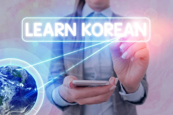Text sign showing Learn Korean. Conceptual photo get knowledge or skill in speaking and writing Korean language Elements of this image furnished by NASA.