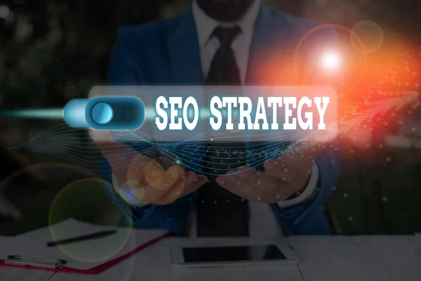 Teks tulisan tangan Seo Strategy. Konsep makna prosedur yang bertujuan untuk meningkatkan visibilitas sebuah situs web . — Stok Foto