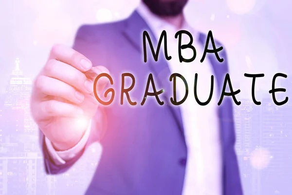 Handwriting text Mba Graduate. Concept meaning masters is degree with specialization in business administration.